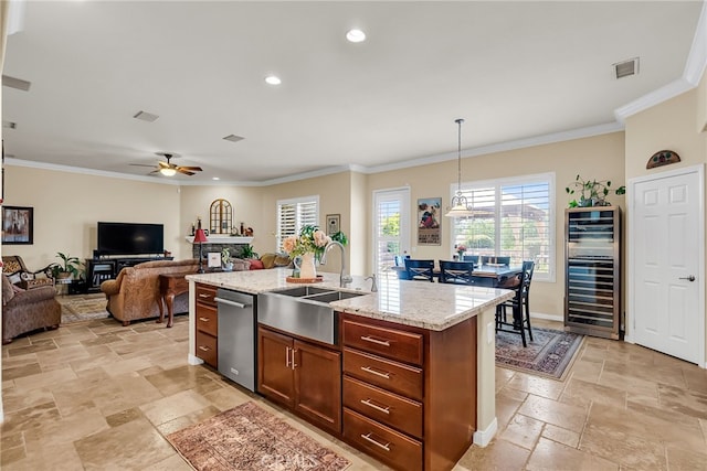 kitchen with a sink, wine cooler, stainless steel dishwasher, stone tile floors, and crown molding
