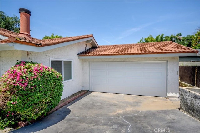 575 Winona Way, Pasadena, CA 91103 - garage featuring concrete driveway