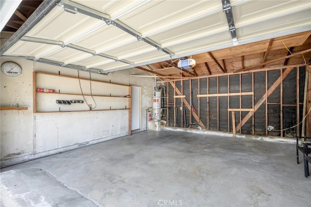 575 Winona Way, Pasadena, CA 91103 - garage featuring strapped water heater and a garage door opener