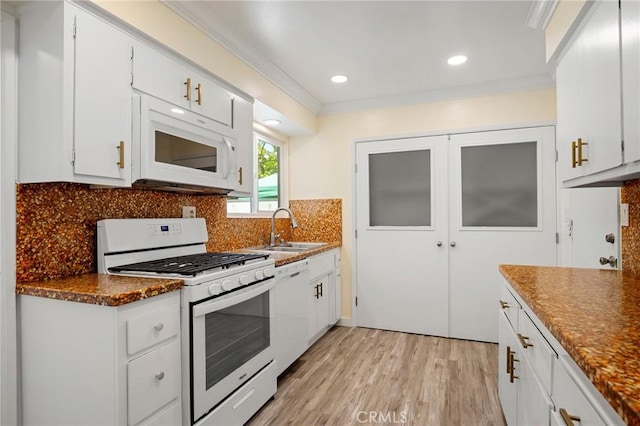 575 Winona Way, Pasadena, CA 91103 - kitchen featuring white appliances, a sink, light wood-style floors, ornamental molding, and white cabinetry