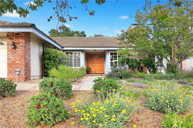2148 Aquinas Ave, Claremont, CA 91711 - entrance to property featuring stucco siding, brick siding, and a chimney