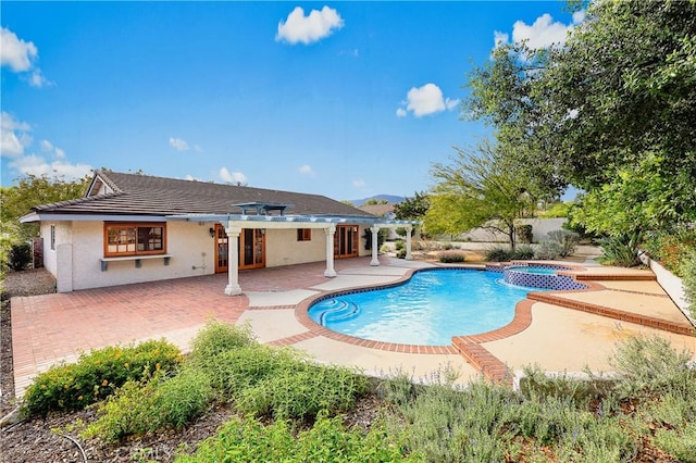 2148 Aquinas Ave, Claremont, CA 91711 - view of swimming pool with a patio area, a pool with connected hot tub, and a pergola