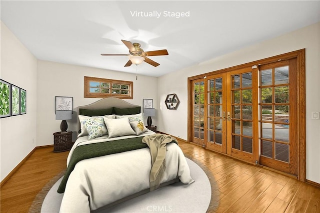 2148 Aquinas Ave, Claremont, CA 91711 - bedroom featuring french doors, multiple windows, and baseboards