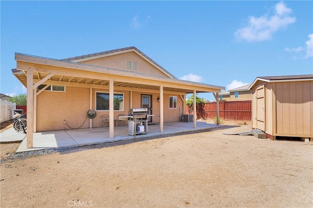 16702 Hastings Pl, Victorville, CA 92395 - rear view of house featuring a patio area, stucco siding, and cooling unit