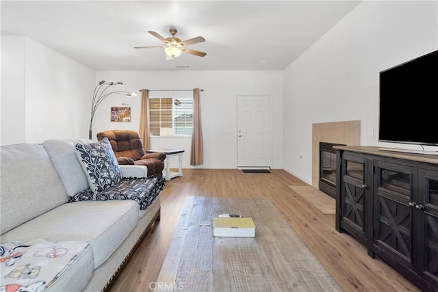 16702 Hastings Pl, Victorville, CA 92395 - living area featuring light wood-style flooring and a ceiling fan