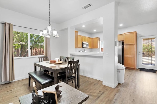 16702 Hastings Pl, Victorville, CA 92395 - dining space featuring a chandelier, light wood-style floors, baseboards, and recessed lighting