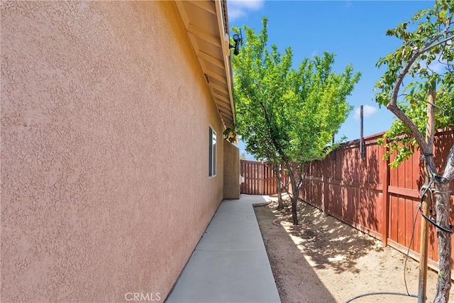 16702 Hastings Pl, Victorville, CA 92395 - view of home's exterior with stucco siding and a fenced backyard
