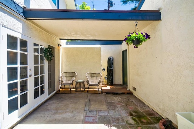 view of patio featuring french doors