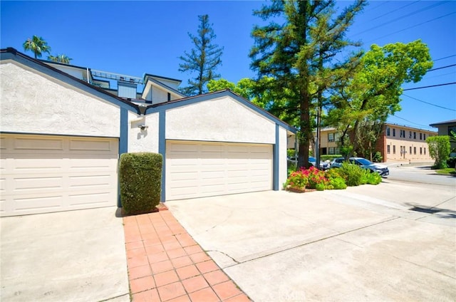 garage featuring driveway