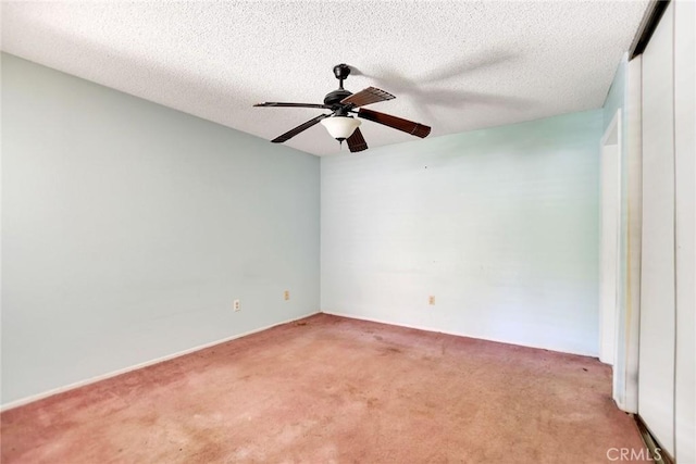 638 W Villa Chaparral Rd, San Jacinto, CA 92583 - unfurnished room with light colored carpet, a ceiling fan, and a textured ceiling