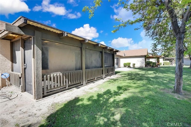 638 W Villa Chaparral Rd, San Jacinto, CA 92583 - view of green lawn featuring a sunroom