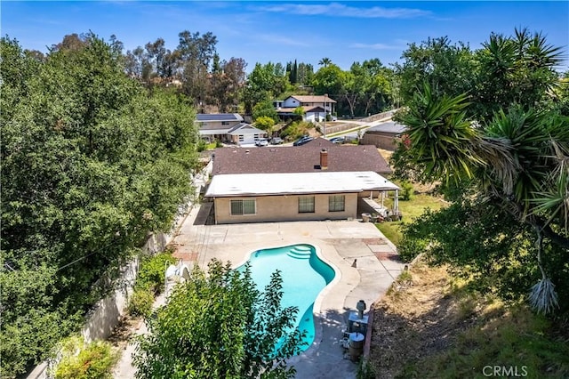 view from above of property featuring a pool