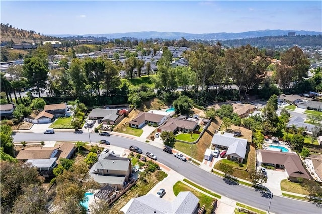 aerial view of residential area featuring a pool