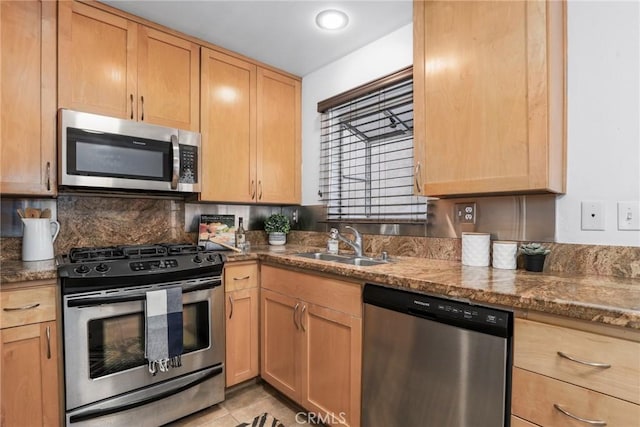 2474 S Centinela Ave Unit 4, Los Angeles, CA 90064 - kitchen featuring appliances with stainless steel finishes, light brown cabinetry, dark stone counters, decorative backsplash, and light tile patterned floors