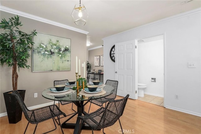2474 S Centinela Ave Unit 4, Los Angeles, CA 90064 - dining space with ornamental molding, light wood-style flooring, and baseboards