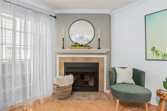2474 S Centinela Ave Unit 4, Los Angeles, CA 90064 - sitting room featuring ornamental molding, a tile fireplace, plenty of natural light, and wood finished floors