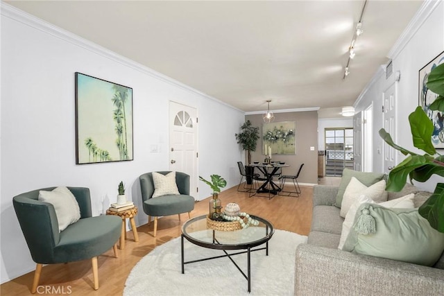 2474 S Centinela Ave Unit 4, Los Angeles, CA 90064 - living room featuring track lighting, ornamental molding, and light wood-type flooring