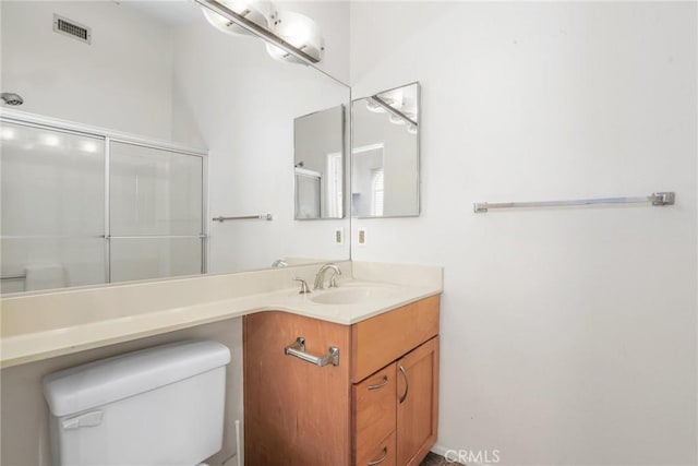 2474 S Centinela Ave Unit 4, Los Angeles, CA 90064 - bathroom with toilet, vanity, and a shower with shower door