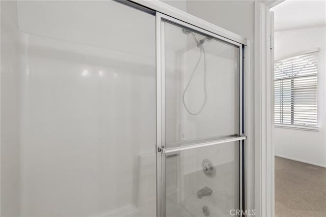 2474 S Centinela Ave Unit 4, Los Angeles, CA 90064 - bathroom featuring baseboards and shower / bath combination with glass door