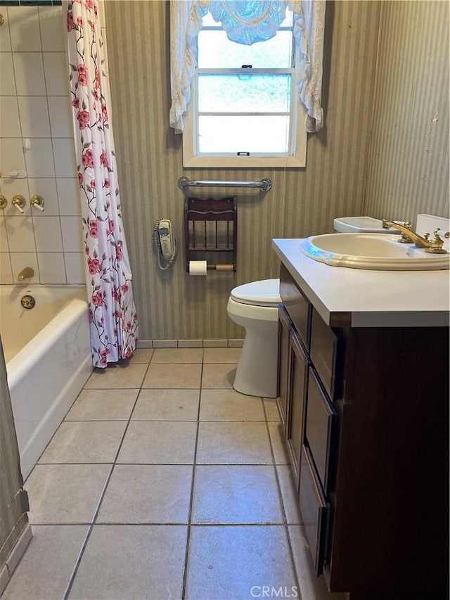 525 S L St, Needles, CA 92363 - bathroom with tile patterned floors, toilet, shower / bath combo, vanity, and wallpapered walls