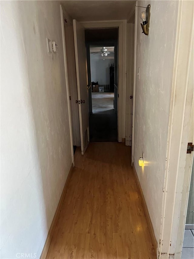 525 S L St, Needles, CA 92363 - hall featuring light wood finished floors and baseboards