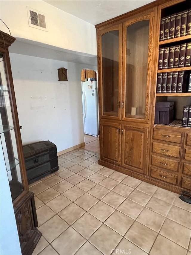 525 S L St, Needles, CA 92363 - unfurnished dining area with light tile patterned flooring