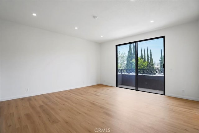 14844 Dickens St Unit 306, Sherman Oaks, CA 91403 - unfurnished room featuring light wood-type flooring, baseboards, and recessed lighting