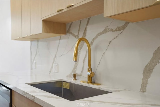 14844 Dickens St Unit 306, Sherman Oaks, CA 91403 - kitchen view of a sink, light stone counters, and light brown cabinets