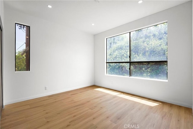 14844 Dickens St Unit 306, Sherman Oaks, CA 91403 - spare room with light wood finished floors, recessed lighting, and baseboards