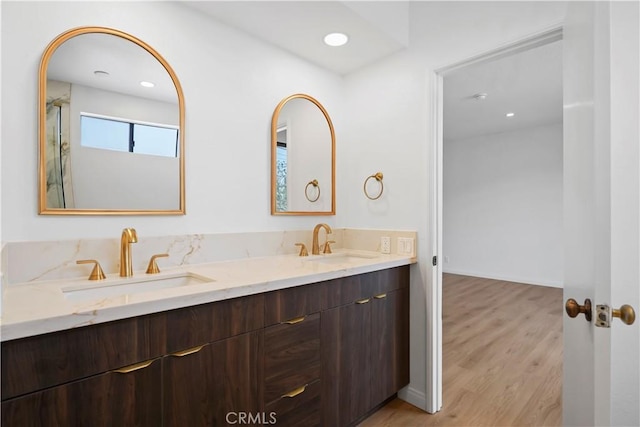14844 Dickens St Unit 306, Sherman Oaks, CA 91403 - bathroom with wood finished floors, double vanity, and recessed lighting