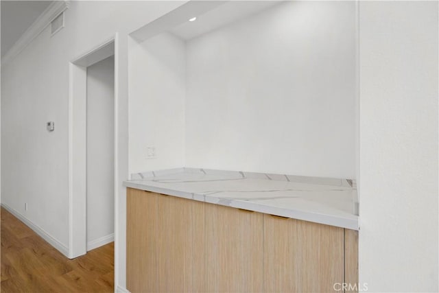 14844 Dickens St Unit 306, Sherman Oaks, CA 91403 - bar featuring light wood finished floors and baseboards