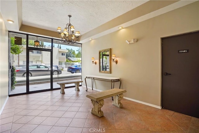 14844 Dickens St Unit 306, Sherman Oaks, CA 91403 - building lobby featuring a textured ceiling