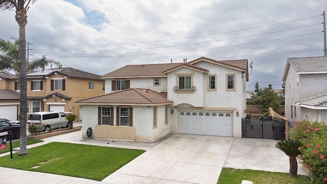 6933 Rio Grande Dr, Eastvale, CA 91752 - mediterranean / spanish-style house featuring stucco siding, a gate, an attached garage, concrete driveway, and a tiled roof