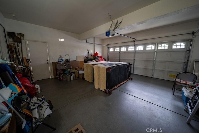 6933 Rio Grande Dr, Eastvale, CA 91752 - garage featuring a garage door opener