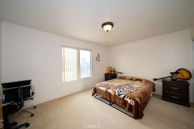 6933 Rio Grande Dr, Eastvale, CA 91752 - bedroom with carpet floors, a desk, and baseboards