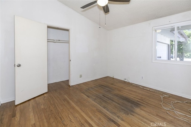 13727 Leadwell St, Van Nuys, CA 91405 - unfurnished bedroom featuring vaulted ceiling, wood finished floors, a closet, ceiling fan, and baseboards