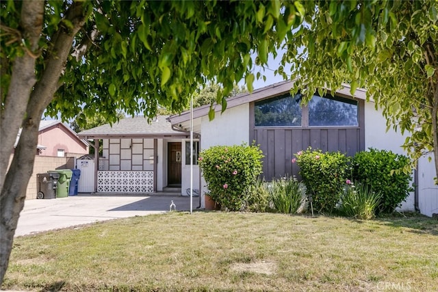13727 Leadwell St, Van Nuys, CA 91405 - view of front of property featuring driveway and stucco siding