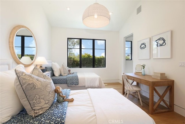 1991 Port Claridge Pl, Newport Beach, CA 92660 - bedroom featuring wood finished floors, vaulted ceiling, and baseboards