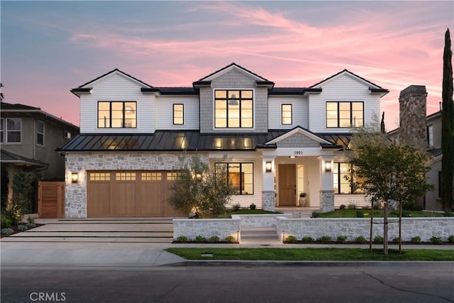 1991 Port Claridge Pl, Newport Beach, CA 92660 - view of front of property with a standing seam roof, driveway, metal roof, an attached garage, and stone siding