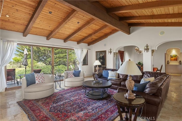 295 Via Piedras Blancas, San Simeon, CA 93452 - living room featuring arched walkways, wooden ceiling, and stone tile floors