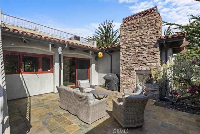 295 Via Piedras Blancas, San Simeon, CA 93452 - view of patio with a grill, a balcony, and an outdoor living space