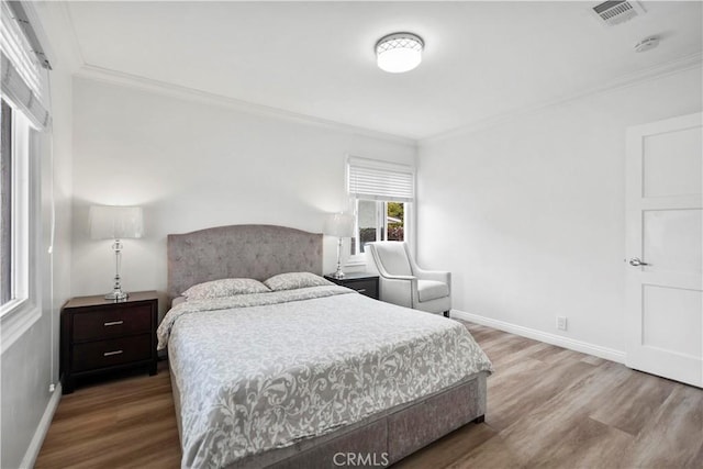 1812 S Granada Ave, Alhambra, CA 91801 - bedroom featuring ornamental molding, wood finished floors, and baseboards