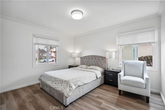 1812 S Granada Ave, Alhambra, CA 91801 - bedroom featuring wood finished floors, crown molding, and baseboards