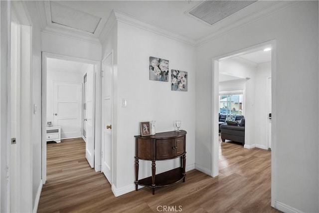 1812 S Granada Ave, Alhambra, CA 91801 - hallway featuring wood finished floors, ornamental molding, baseboards, and attic access
