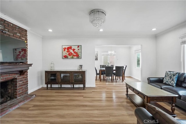1812 S Granada Ave, Alhambra, CA 91801 - living room with a chandelier, light wood finished floors, ornamental molding, baseboards, and recessed lighting