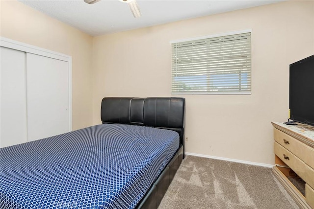 5915 Weedpatch, Bakersfield, CA 93307 - carpeted bedroom featuring baseboards, a closet, and a ceiling fan