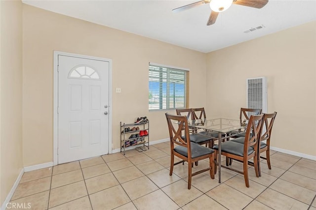 5915 Weedpatch, Bakersfield, CA 93307 - dining space with a ceiling fan, light tile patterned floors, and baseboards