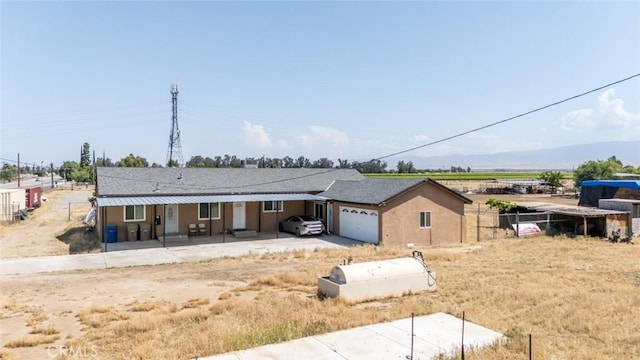 5915 Weedpatch, Bakersfield, CA 93307 - view of front of home with an attached garage
