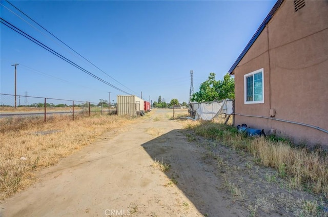 5915 Weedpatch, Bakersfield, CA 93307 - view of yard with driveway