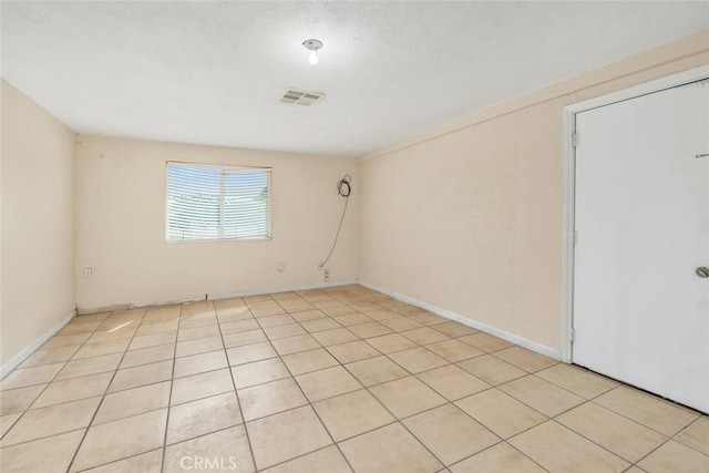 5915 Weedpatch, Bakersfield, CA 93307 - unfurnished room featuring light tile patterned flooring